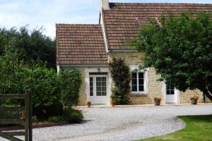 Maisons de vacances Maison d'une chambre a Sainte Marie du Mont a 100 m de la plage avec jardin clos et wifi : photos des chambres