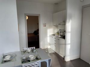 Appartements T1 40 m2. Lit Queen size : photos des chambres