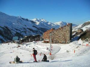 Appartement charmant à Les Menuires, 36 m², vue montagne.