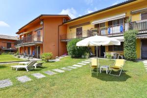 Charming apartment in Pacengo, garden view, 60 sqm