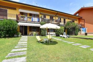 Charming apartment in Pacengo, garden view, 60 sqm