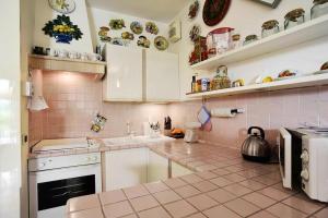 Charming apartment in Pacengo, garden view, 60 sqm