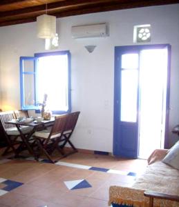 Apartment with one bedroom in Ormos Kardianis with wonderful sea view furnished terrace an Tinos Greece