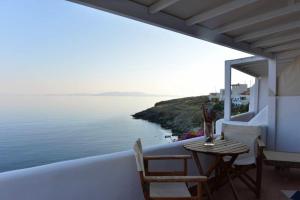 Apartment with one bedroom in Ormos Kardianis with wonderful sea view furnished terrace an Tinos Greece