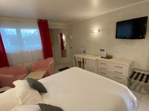 Hotels Contact hotel - Motel Les Bleuets : photos des chambres