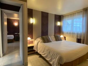 Hotels Contact hotel - Motel Les Bleuets : photos des chambres