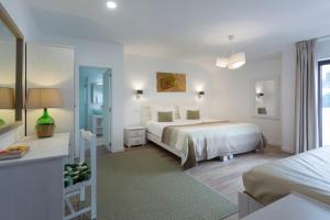 Triple Room with Balcony room in Casa do Outeiro - Arts & Crafts Boutique Hotel