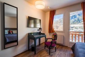 Hotels L'Outa Hotel Restaurant : photos des chambres