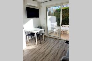 Appartements T2 Rez de chaussee climatise jardin parking prive : photos des chambres