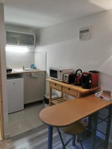 Appartements La petite cour : photos des chambres