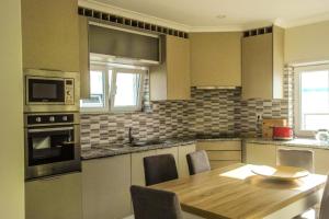 Spacious House in Atalaia with Shared Pool