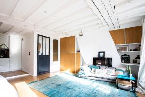 Appartements Veeve - Modern Minimalism in the Heart of Paris : photos des chambres