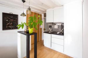 Appartements Veeve - Modern Minimalism in the Heart of Paris : photos des chambres