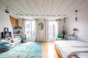 Appartements Veeve - Modern Minimalism in the Heart of Paris : photos des chambres