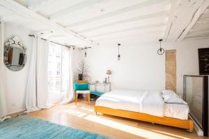 Appartements Veeve - Modern Minimalism in the Heart of Paris : photos des chambres