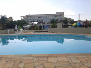 APTO TÉRREO a 50 Metros do MAR em Condomínio com PISCINAS MARAVILHOSAS