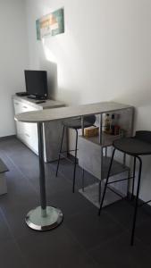 Appartements charmant studio dans residence neuve et calme : photos des chambres