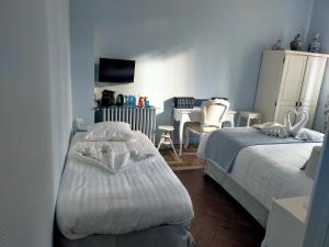 B&B / Chambres d'hotes La Maison Bleue de Roubaix : photos des chambres
