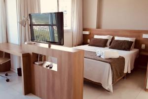 Flat TOP e PERFEITO inteiro na Barra da Tijuca com cozinha, lavanderia, GARAGEM e wi fi