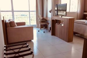 Flat TOP e PERFEITO inteiro na Barra da Tijuca com cozinha, lavanderia, GARAGEM e wi fi