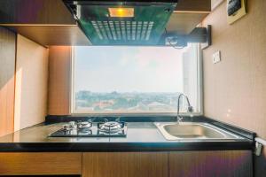 Compact and Simple Studio Apartment at Saladdin Mansion By Travelio