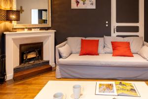 Appartements Centre ville et gare a pied - Parking et patio : photos des chambres