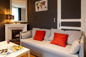 Appartements Centre ville et gare a pied - Parking et patio : photos des chambres