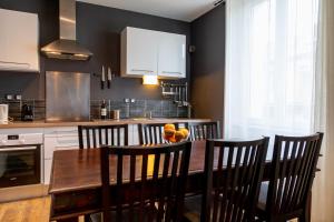 Appartements Centre ville et gare a pied - Parking et patio : photos des chambres