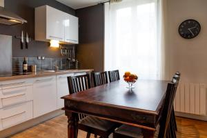 Appartements Centre ville et gare a pied - Parking et patio : photos des chambres