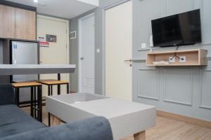 Comfortable and Homey 2BR Apartment at M-Town Residence By Travelio