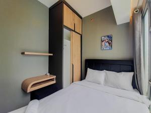 Comfortable and Homey 2BR Apartment at M-Town Residence By Travelio