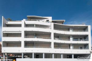 Appartements L'orangeraie Calvi centre a 300m de la plage et du port parking prive : photos des chambres