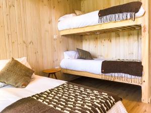 OUTSCAPE l Cabañas en Puerto Fuy, Huilo Huilo a Orillas del Lago