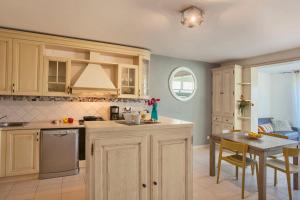 Appartements Mare appart avec jardin et bbq vue mer et montagne plage et port a 2 pas : photos des chambres