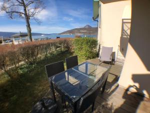 Appartements Studio les Pieds dans L'eau au bord du lac d'Annecy : photos des chambres