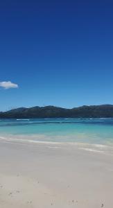 Yes Papa! Rooms only 100m from the beach!