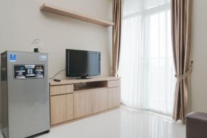 Cozy and Wonderful 1BR Ciputra International Apartment By Travelio