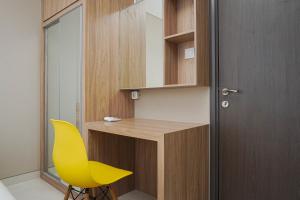 Cozy and Wonderful 1BR Ciputra International Apartment By Travelio