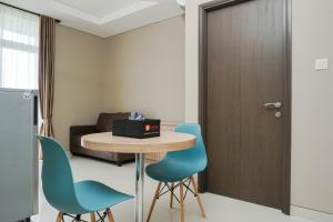Cozy and Wonderful 1BR Ciputra International Apartment By Travelio