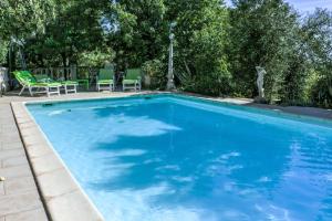 Maisons de vacances Maison d'une chambre avec piscine partagee terrasse amenagee et wifi a Pougnadoresse : photos des chambres