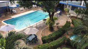 a hotel com melgar alojamiento barato