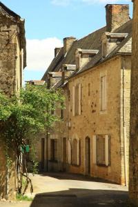 Maisons de vacances Petite maison en pierre au coeur du Perigord noir proche de Sarlat et Rocamadour : photos des chambres