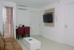 Furnished and Relaxing 2BR Bassura City Apartment near Mall By Travelio