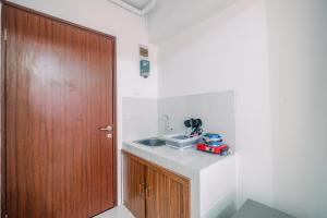 Beautiful Studio at Gunung Putri Square Apartment By Travelio
