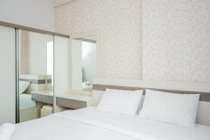 Beautiful 2BR at Tree Park City BSD Apartment By Travelio