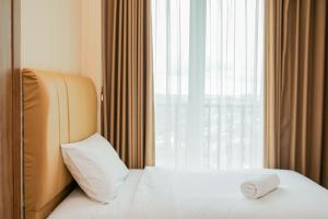 Beautiful 2BR at Tree Park City BSD Apartment By Travelio