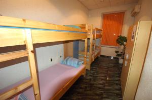 Bed in 4-Bed Mixed Dormitory Room room in Yo Ho Hostel
