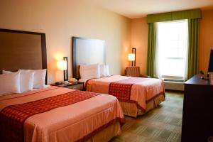 Queen Room with Two Queen Beds Non Smoking room in Coratel Inn & Suites Cotulla