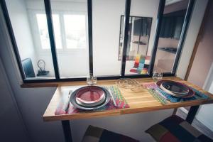 Studio cosy les pieds dans leau, climatisé, Parking privé, Vue montagne