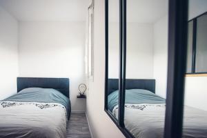 Studio cosy les pieds dans leau, climatisé, Parking privé, Vue montagne